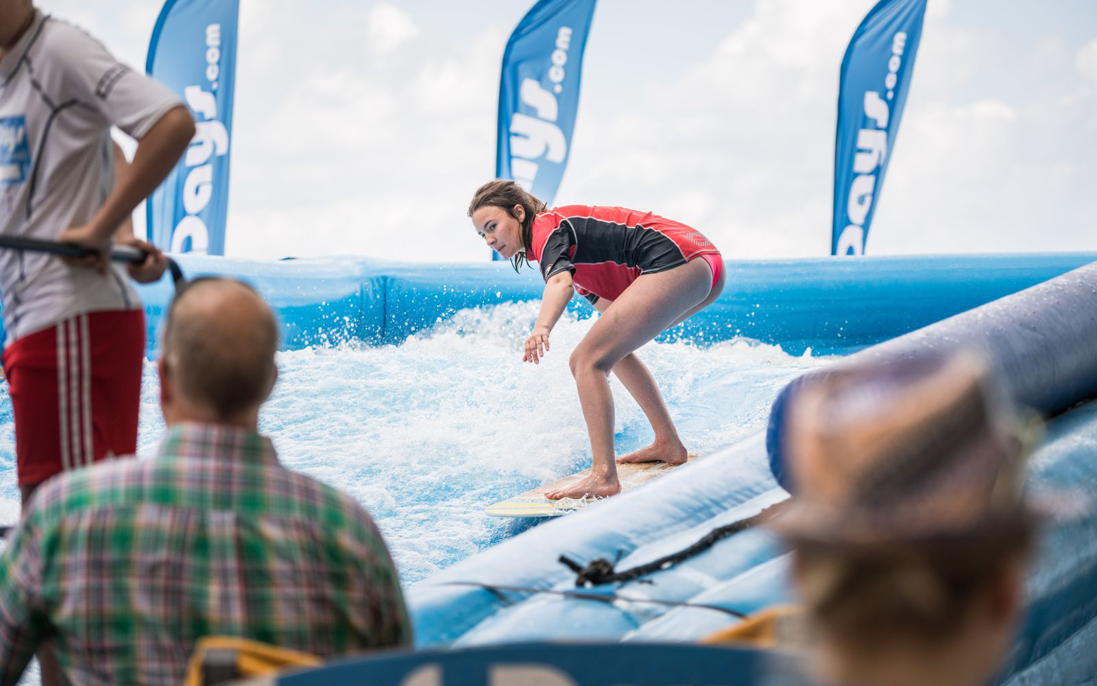 Mobile surf wave attraction for resorts and premium guest experience programming
